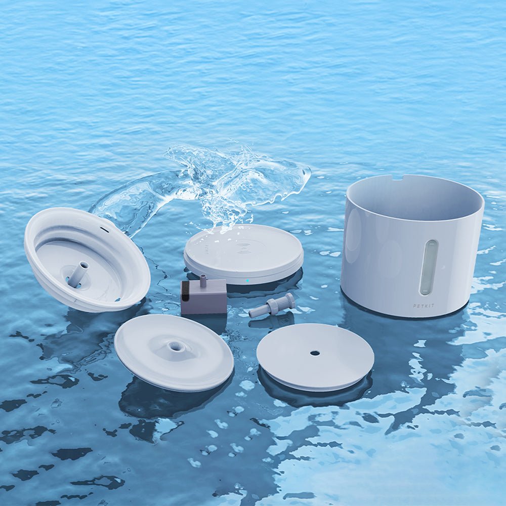 EverSweet Solo 2 Pet Water Fountain components placed in water to illustrate easy disassembly and cleaning